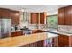 Updated kitchen featuring stainless steel appliances, granite counters, and wood cabinets at 2605 Cactus Cir, Golden, CO 80401