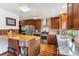 Updated kitchen with stainless steel appliances, granite counters and wood cabinets at 2605 Cactus Cir, Golden, CO 80401