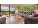 Inviting living room with hardwood floors, view and sliding glass doors to deck at 2605 Cactus Cir, Golden, CO 80401