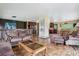 Open floor plan living room leading to dining and kitchen, hardwood flooring at 2605 Cactus Cir, Golden, CO 80401