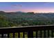 Expansive view showcases rolling mountains and lush greenery, providing a breathtaking and scenic backdrop at 2605 Cactus Cir, Golden, CO 80401