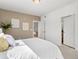 Bedroom with access to hall, closet and view of dining area at 9019 E Panorama Cir # D204, Englewood, CO 80112