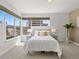Sunlit bedroom with large windows showcasing exterior views at 9019 E Panorama Cir # D204, Englewood, CO 80112