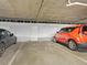 Clean parking garage space for residents, complete with marked spaces and secure access at 9019 E Panorama Cir # D204, Englewood, CO 80112