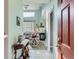 Entryway with a view of the living room and fireplace at 4936 Stoneham Ave, Castle Rock, CO 80104