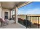 Relax on this spacious balcony with seating and stunning mountain views at 2405 Calais Dr # 18A, Longmont, CO 80504