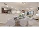 Bright and modern dining area open to kitchen and living room at 2405 Calais Dr # 18A, Longmont, CO 80504