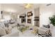 Stylish living room featuring a fireplace and seamless flow to other spaces at 2405 Calais Dr # 18A, Longmont, CO 80504