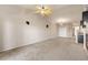A bright, empty living room with neutral walls, carpet and updated features at 2405 Calais Dr # 18A, Longmont, CO 80504