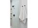 Beautiful bathroom featuring tile shower with glass door and contemporary towel hooks at 1601 Park Ave # 212, Denver, CO 80218