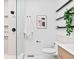 Modern bathroom with a glass-enclosed shower, floating shelves, and a clean design at 1601 Park Ave # 212, Denver, CO 80218