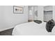 Simple bedroom design with modern decor, neutral color palette, and plenty of natural light at 1601 Park Ave # 212, Denver, CO 80218