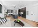 A large and airy living space includes a modern kitchen, dining area and living room at 1601 Park Ave # 212, Denver, CO 80218
