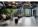 Relaxing lobby area with hanging chairs, plants, and stylish decor for a welcoming entrance at 1601 Park Ave # 212, Denver, CO 80218