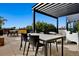 Expansive rooftop patio offers a blend of shaded dining and lounge spaces for ultimate relaxation at 1601 Park Ave # 212, Denver, CO 80218