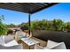 Modern rooftop patio with ample seating, perfect for entertaining guests and enjoying city views at 1601 Park Ave # 212, Denver, CO 80218