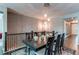 Charming dining area with pendant lighting and seating for six, with stair access at 25144 E Archer Pl, Aurora, CO 80018