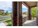 Inviting front porch with stone accents and views of the street and neighborhood at 25144 E Archer Pl, Aurora, CO 80018