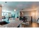 Open concept living area featuring a modern kitchen, dining space, and comfortable living room at 25144 E Archer Pl, Aurora, CO 80018