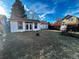 Expansive backyard featuring an outbuilding, shed and fire pit at 9135 W Maplewood Ave, Littleton, CO 80123