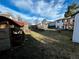 A vast backyard with a chicken coop in view at 9135 W Maplewood Ave, Littleton, CO 80123