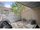 Private outdoor space on the back patio, complete with seating and a grill area, perfect for relaxing at 8095 E Colorado Ave # 5, Denver, CO 80231