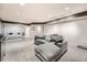 Large finished basement with a couch and carpet at 8095 E Colorado Ave # 5, Denver, CO 80231
