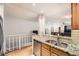 Kitchen with updated stainless steel appliances and granite countertops at 8095 E Colorado Ave # 5, Denver, CO 80231
