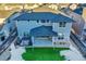 Aerial view of the home, backyard and patio area from above on a sunny day at 6801 S Valleyhead Ct, Aurora, CO 80016
