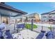 Inviting backyard and patio area with a porch swing perfect for relaxing at 6801 S Valleyhead Ct, Aurora, CO 80016