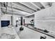 Finished basement featuring a home gym, exercise equipment, and a functional layout at 6801 S Valleyhead Ct, Aurora, CO 80016