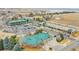 Aerial view of commercial property with ample parking and attractive landscaping at 740 Boxwood Ln, Longmont, CO 80503