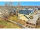 A home featuring a large fenced backyard with grass and a playset is great for and outdoor enjoyment at 740 Boxwood Ln, Longmont, CO 80503