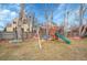 A backyard featuring a large fenced backyard with grass and a playset is great for and outdoor enjoyment at 740 Boxwood Ln, Longmont, CO 80503