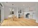 Dining room with lots of natural light, hardwood floors and modern stainless steel appliances at 740 Boxwood Ln, Longmont, CO 80503