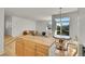 Open floor plan connecting the living and dining areas, with a cozy seating area at 740 Boxwood Ln, Longmont, CO 80503