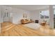 Cozy living room with modern finishes, hardwood floors, and plenty of natural light at 740 Boxwood Ln, Longmont, CO 80503
