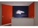 Finished basement with bar area and decorative wall accent at 15501 E 112Th Ave # 20C, Commerce City, CO 80022