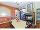 Dining room featuring a fireplace, hardwood floors and stylish decor at 15501 E 112Th Ave # 20C, Commerce City, CO 80022