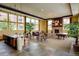 Spacious clubhouse featuring a pool table, ample seating, and large windows for community engagement at 13456 Via Varra # 211, Broomfield, CO 80020