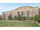Condo building exterior with landscaped lawn at 13456 Via Varra # 211, Broomfield, CO 80020