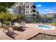 Outdoor firepit with seating and hot tub at 13456 Via Varra # 211, Broomfield, CO 80020