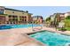 Community pool with hot tub and outdoor seating at 13456 Via Varra # 211, Broomfield, CO 80020