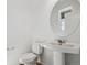 Bathroom with pedestal sink and toilet at 3360 N Coolidge Way Way, Aurora, CO 80019