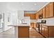 Modern kitchen featuring stainless appliances, light cabinets, and hardwood flooring at 3360 N Coolidge Way Way, Aurora, CO 80019
