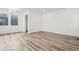 Spacious living area featuring hardwood floors and recessed lighting, ready for customization at 3360 N Coolidge Way Way, Aurora, CO 80019
