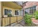 Cozy condo patio with seating, a privacy screen, and views of the surrounding community at 13704 E Lehigh Ave # D, Aurora, CO 80014