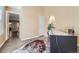 Inviting room features wood floors, neutral paint, and lots of natural light from the oversized windows at 13704 E Lehigh Ave # D, Aurora, CO 80014