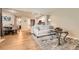 Bright and airy living room with an open floor plan and seamless flow to the kitchen and dining areas at 13704 E Lehigh Ave # D, Aurora, CO 80014