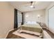 Inviting main bedroom featuring natural light, and soft textures, creating a relaxing retreat at 13704 E Lehigh Ave # D, Aurora, CO 80014